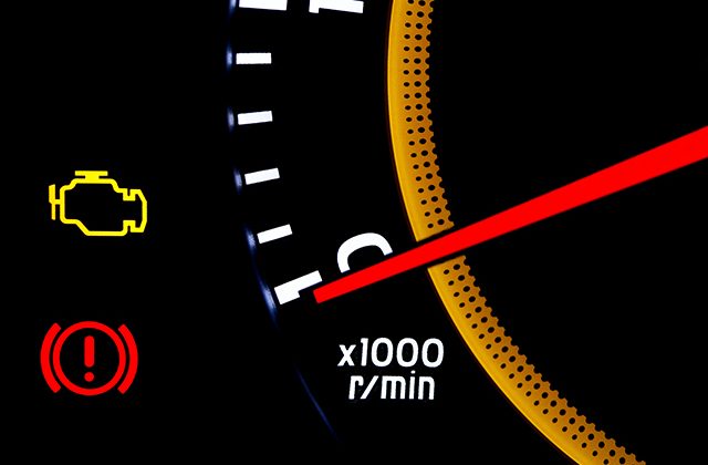 check engine light and odometer with warning light